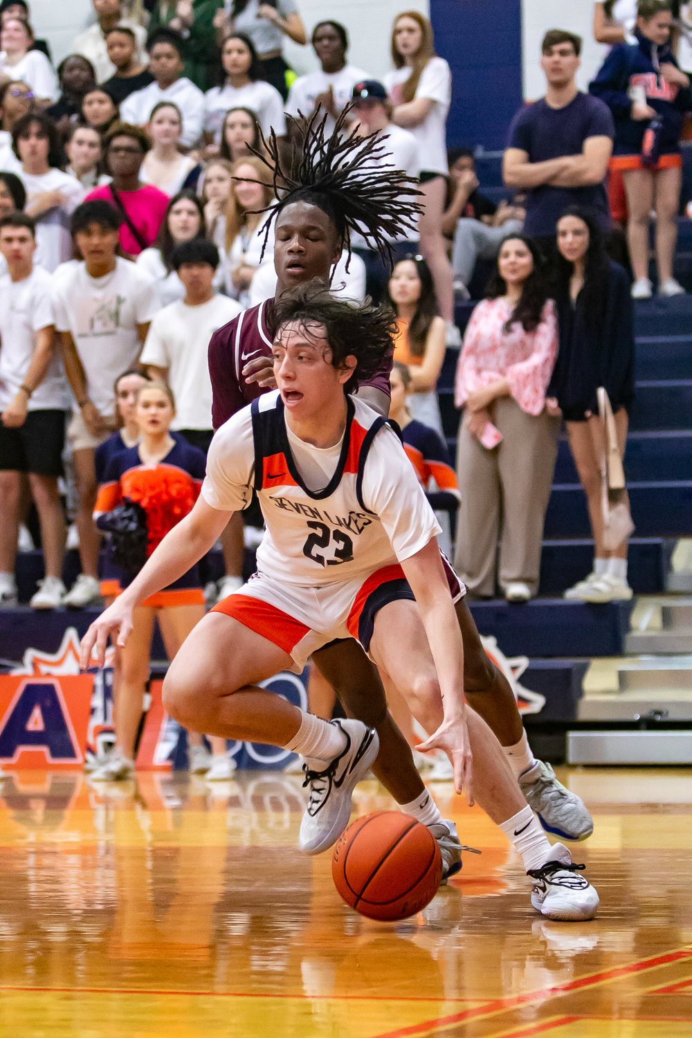Brett Norton drives towards the basket during Saturday's game between Seven Lakes and Cinco Ranch at the Seven Lakes gym.