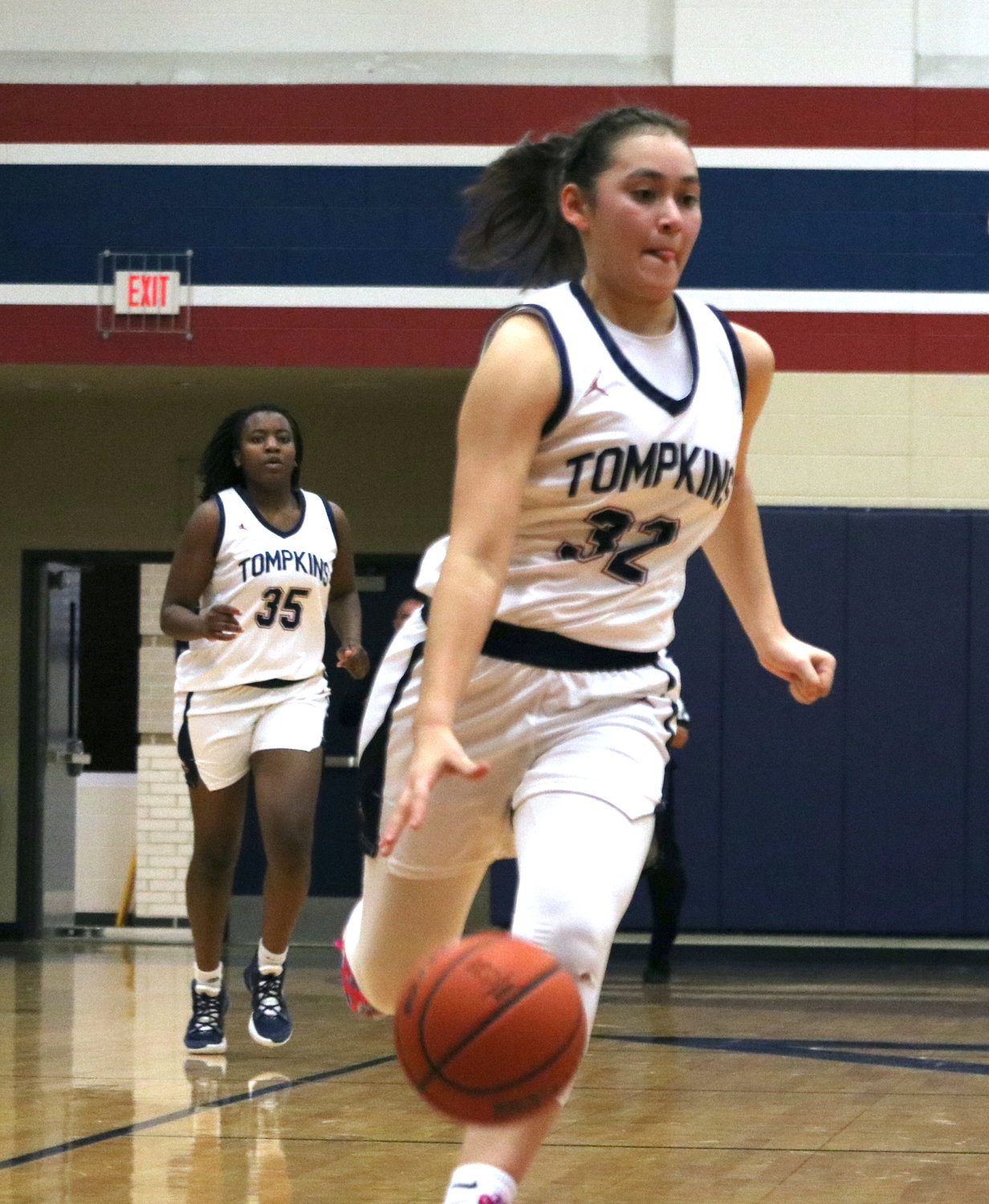 Rihanna DeLeon dribbles up the court during Friday’s game between Tompkins and Cinco Ranch at the Tompkins gym.