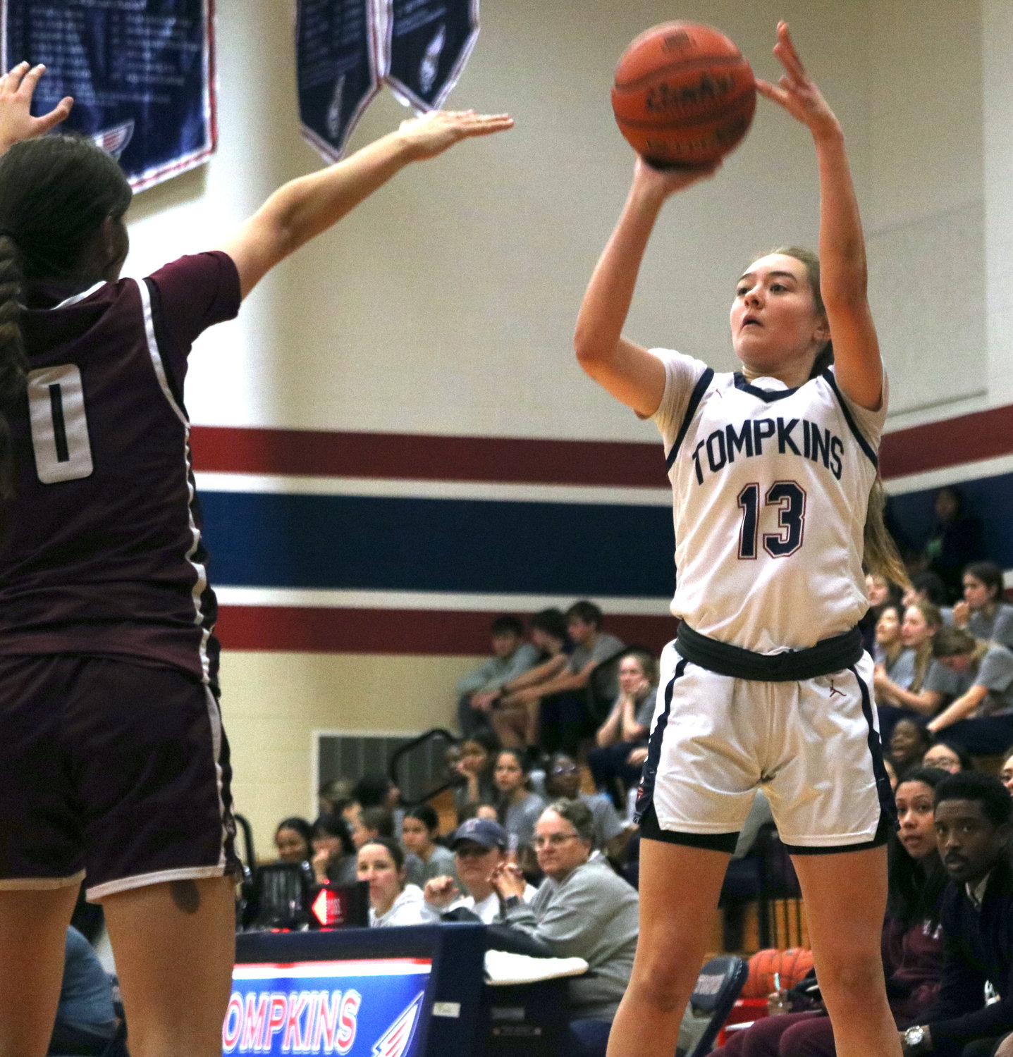 Macy Spencer shoots a jumpshot during Friday’s game between Tompkins and Cinco Ranch at the Tompkins gym.