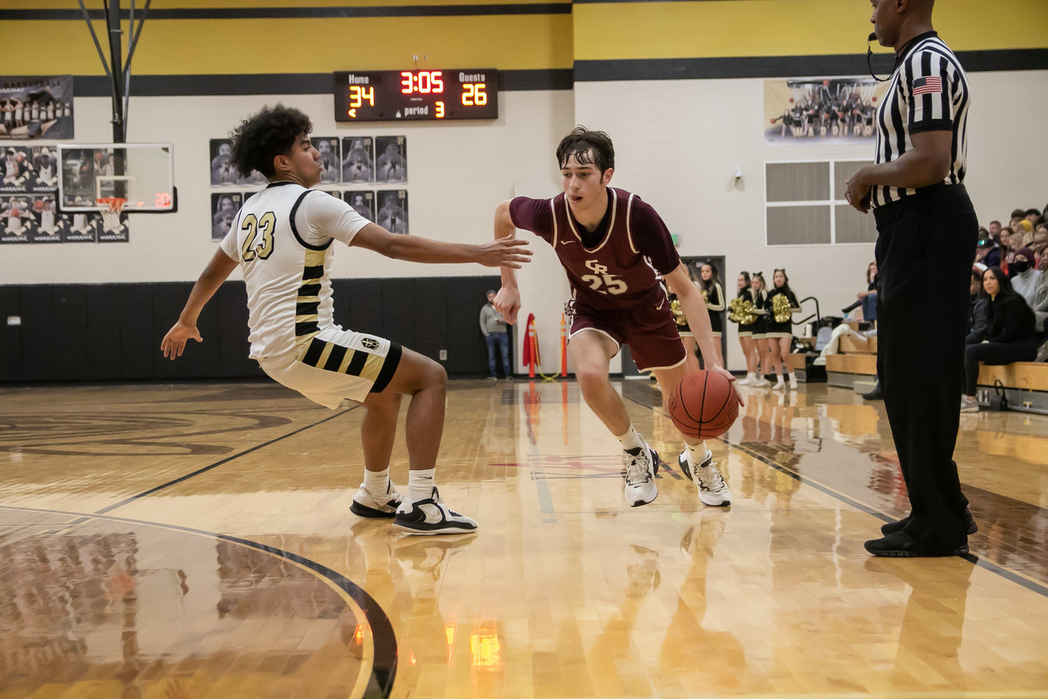 Josh Lennon drives past a defender during Tuesday's game between Cinco Ranch and Jordan at the Jordan gym.