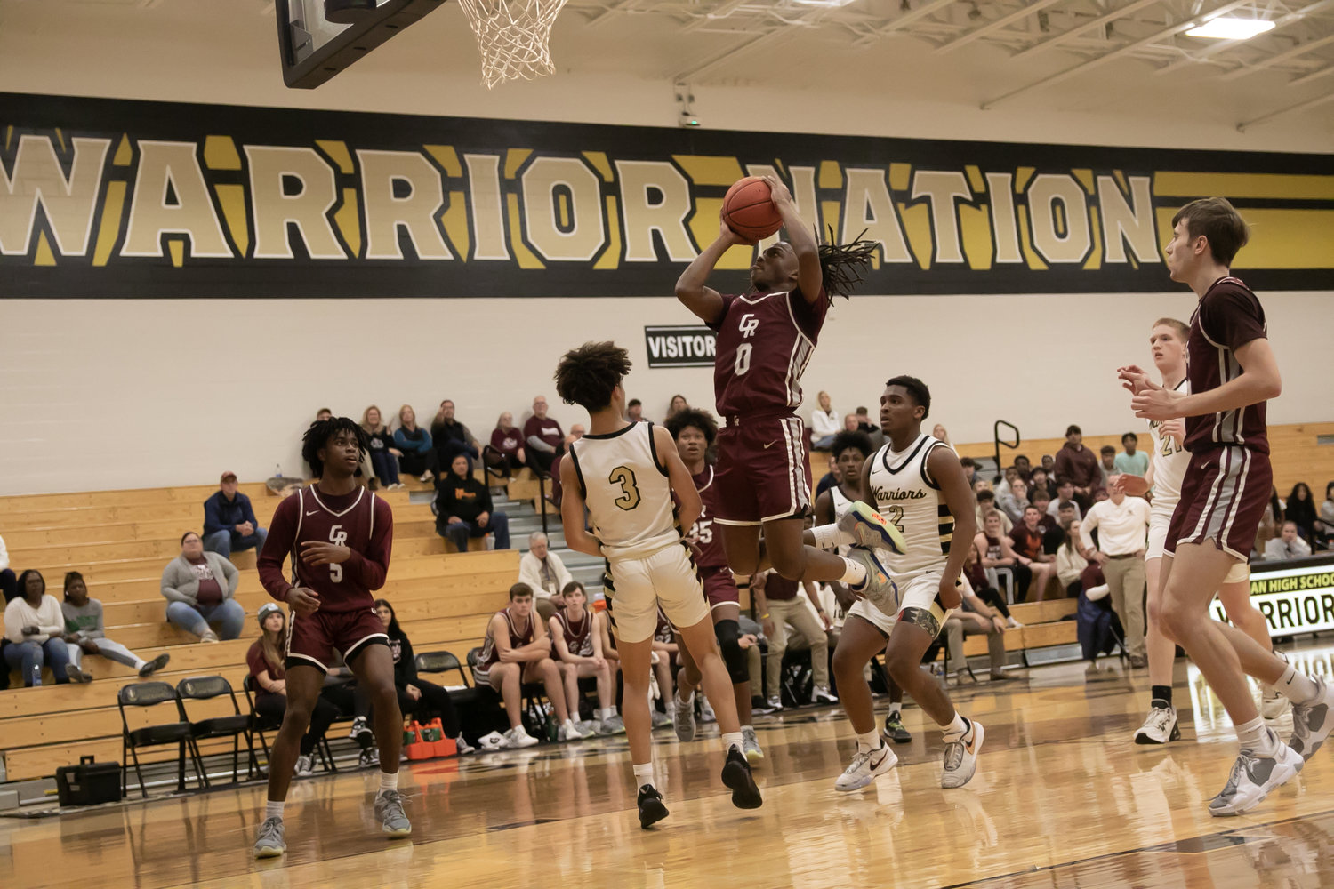 Prince Jones Bynum goes up for a layup during Tuesday's game between Cinco Ranch and Jordan at the Jordan gym.