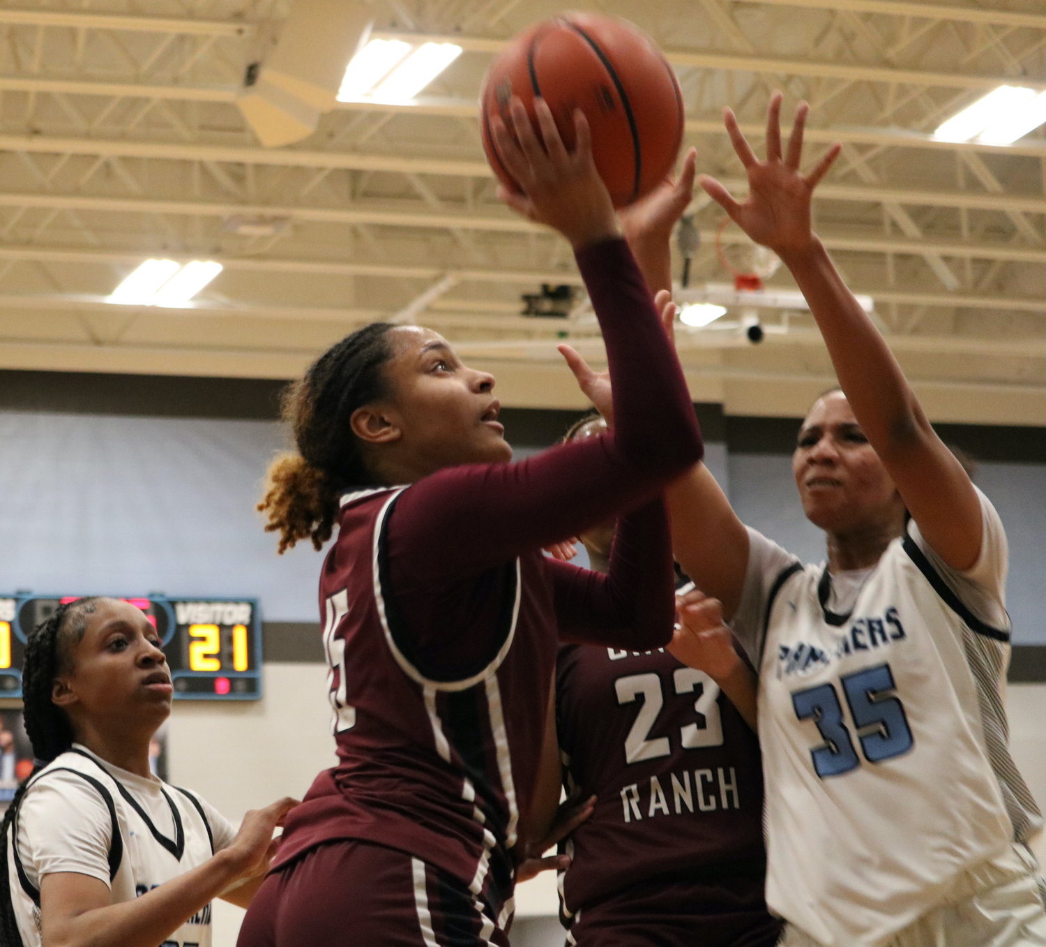 Dani Williams goes up for a layup during Friday's game between Cinco Ranch and Paetow at the Paetow gym.