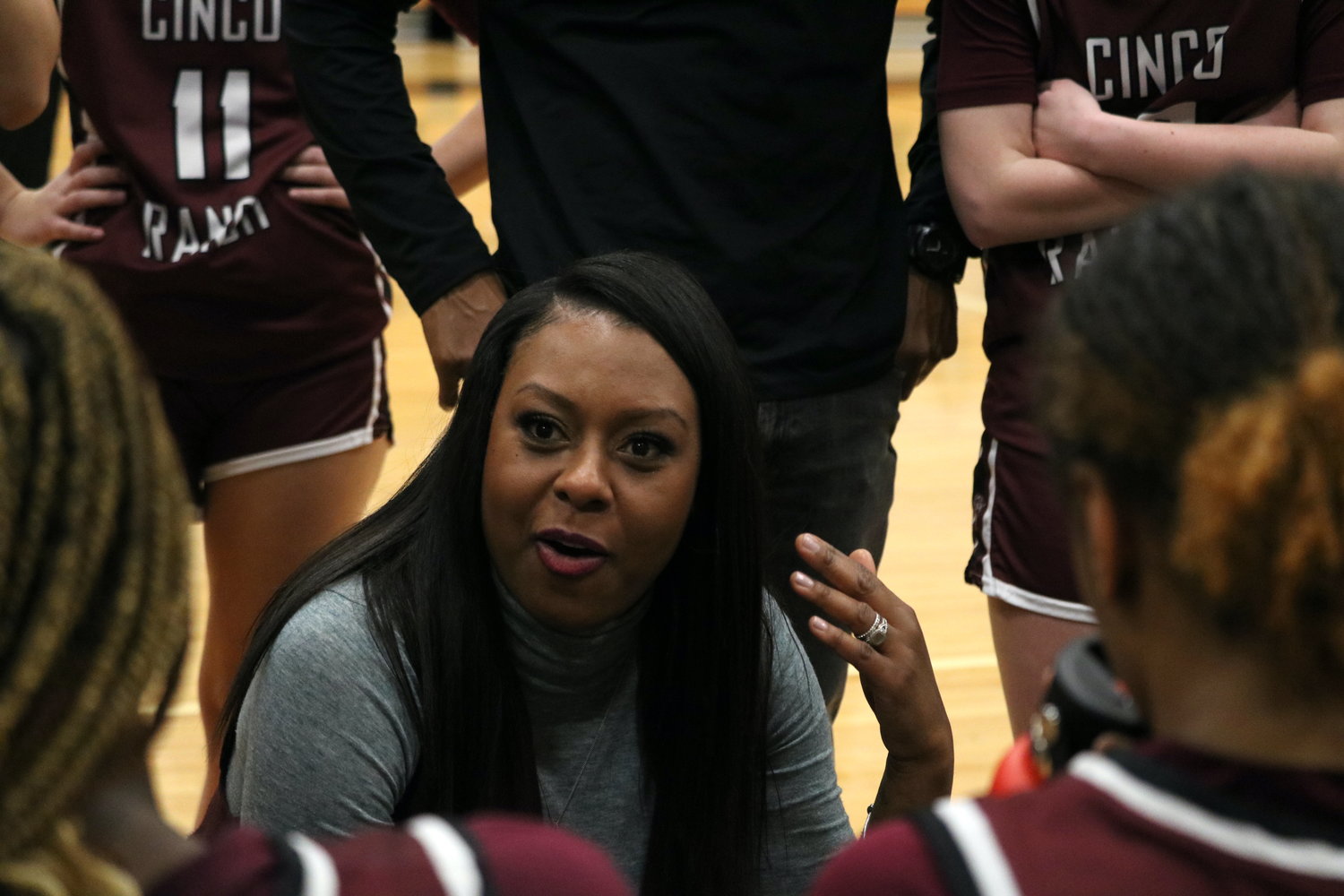 Cinco Ranch head coach Tamara Collier talks to her team during a timeout during Friday's game between Cinco Ranch and Paetow at the Paetow gym.