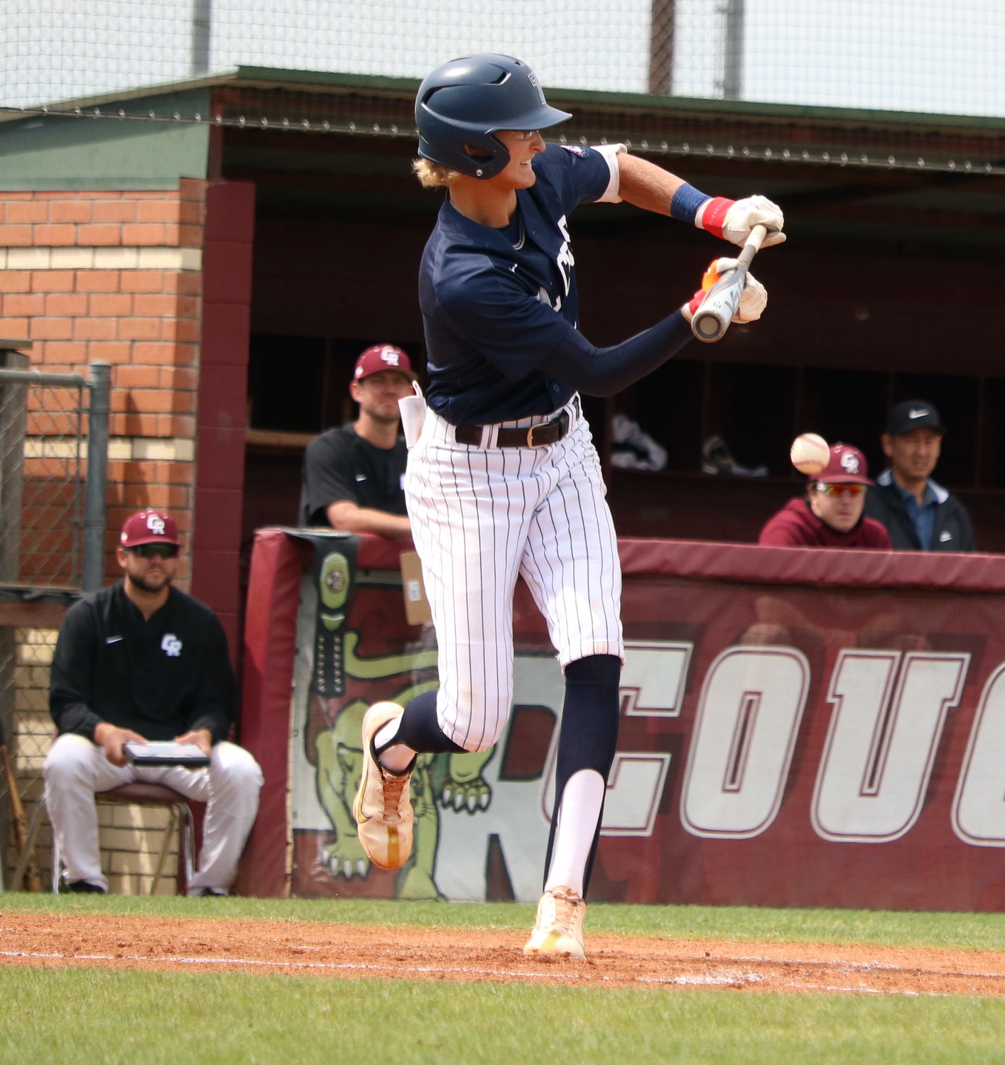Drew Markle bunts during Tuesday's game between Tompkins and Cinco Ranch at the Cinco Ranch baseball field.