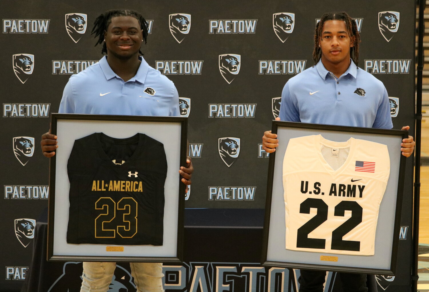 D.J. Hicks and Daymion Sanford were presented with frames of their All-American jersey's.