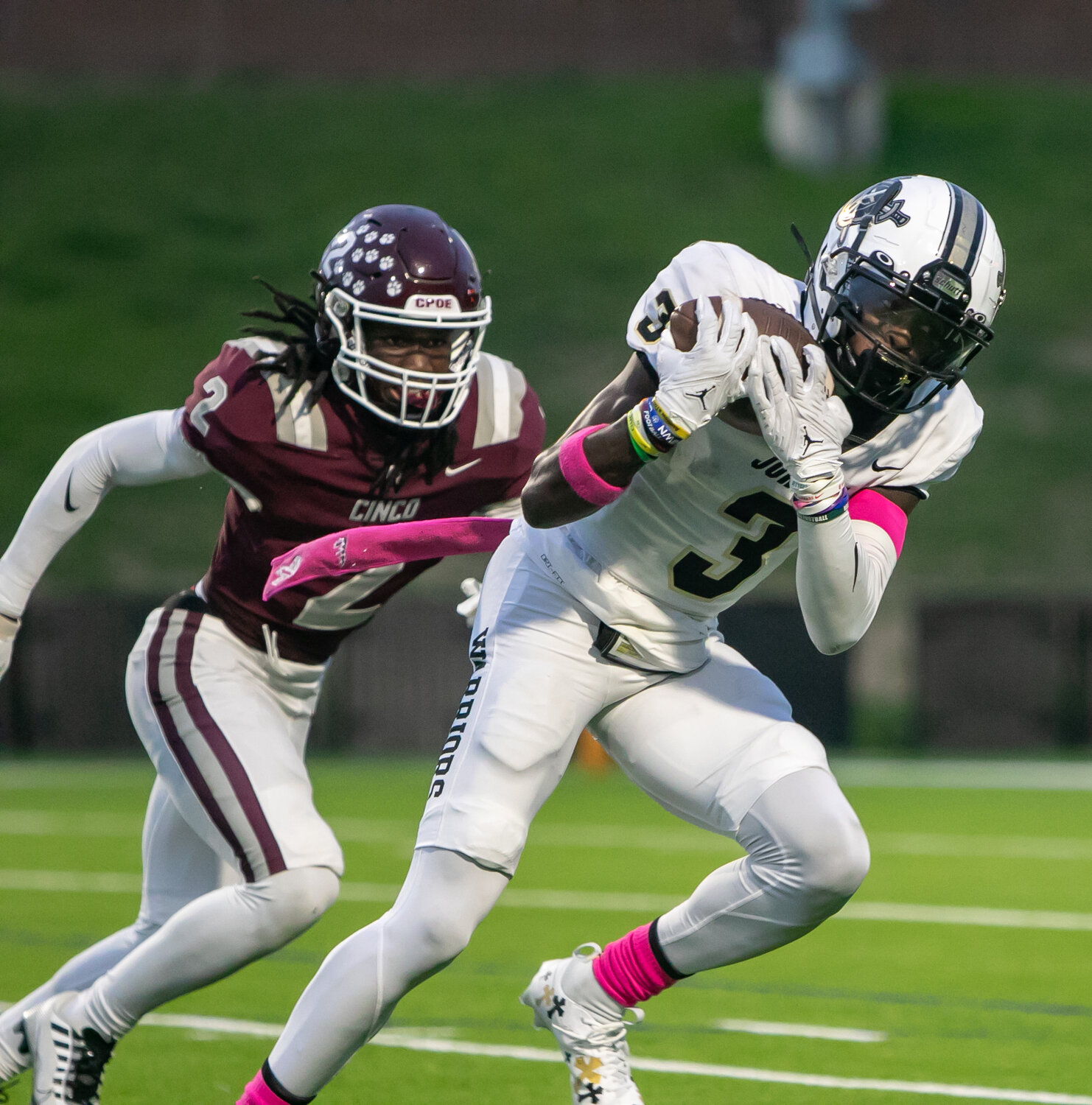Andrew Marsh catches a pass during Friday's game between Jordan and Cinco Ranch at Rhodes Stadium.