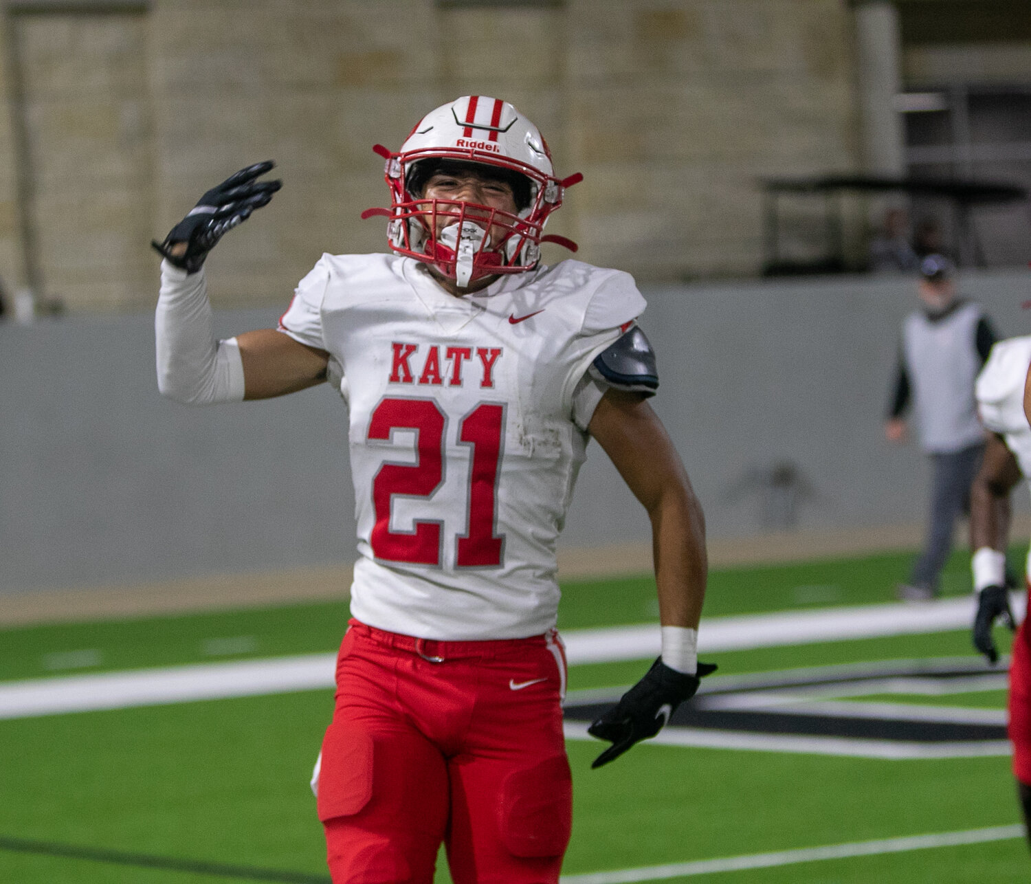 Joshua Garcia celebrates after recovering a fumble during Friday's area round game between Katy and Cy-Fair at the Berry Center in Cypress.
