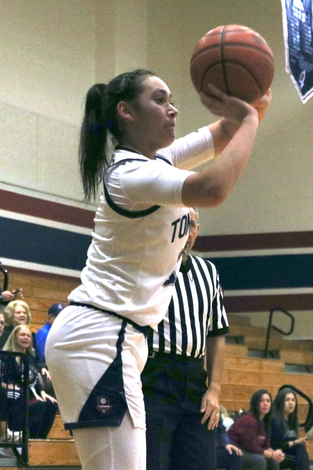 Rihanna DeLeon shoots a 3-pointer during Tuesday's game between Tompkins and Cinco Ranch at the Tompkins gym.