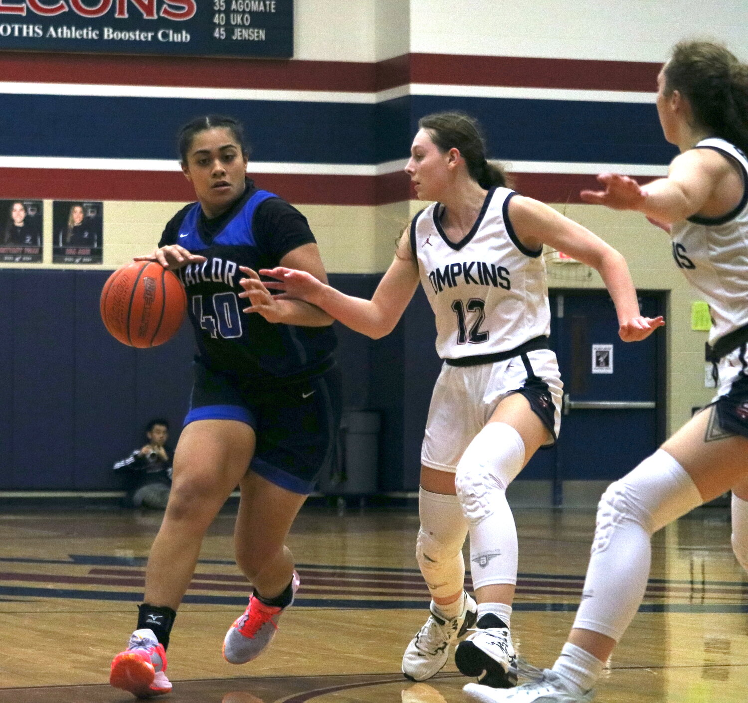 Fiapaipaitufanuaitamalii Filoialii drives to the basket during Friday's game between Taylor and Tompkins at the Tompkins gym.