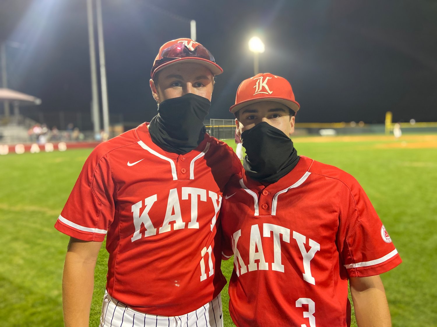Katy High seniors Ryan Brome, left, and Caleb Matthews, pose for a photo after a 6-2 win over Cinco Ranch on Tuesday, March 16, at Cinco Ranch High.