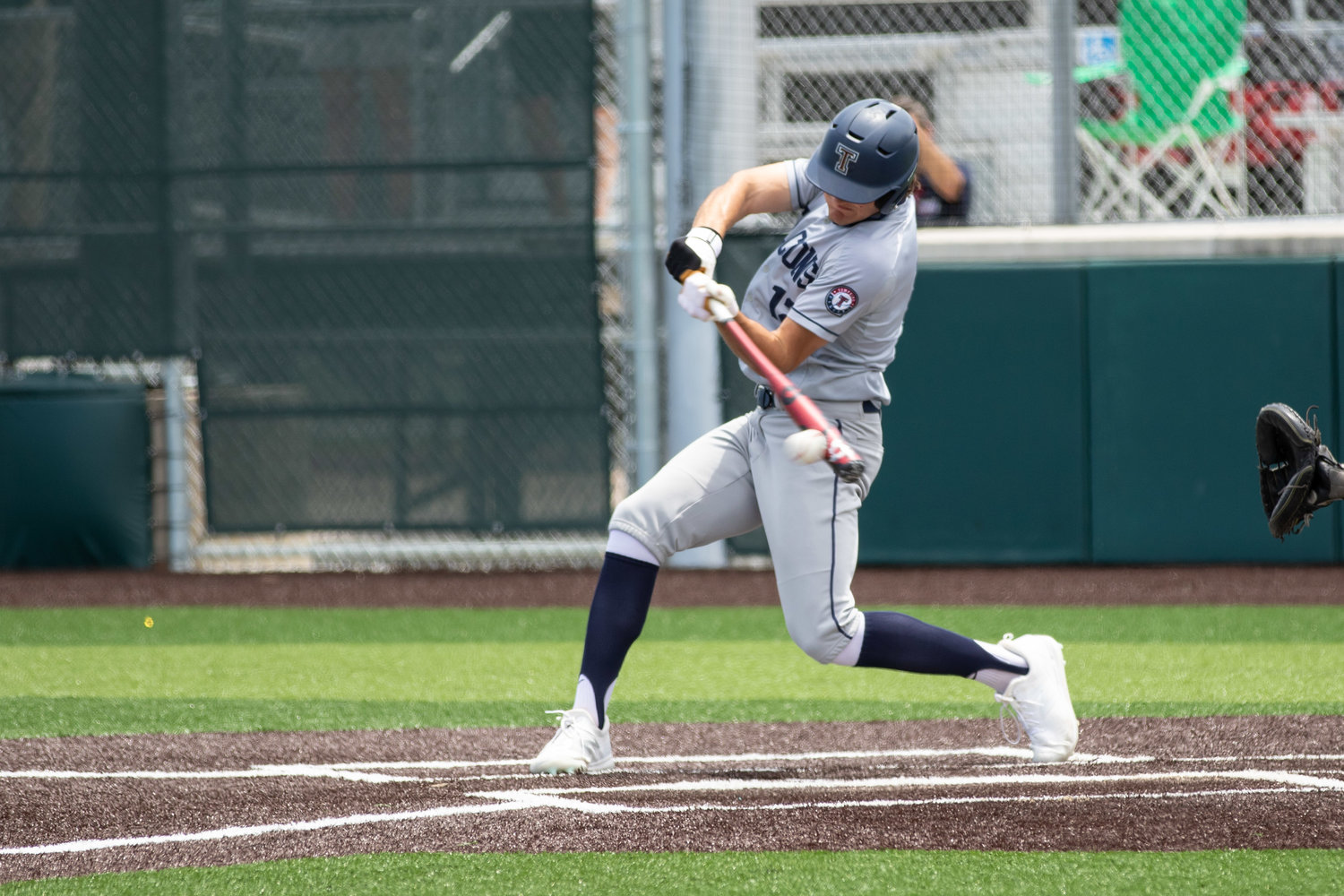 Tompkins senior Jace Laviolette takes a swing during Game 3 of the Falcons’ Region III-6A semifinals against Strake Jesuit last year at Cy-Falls High.