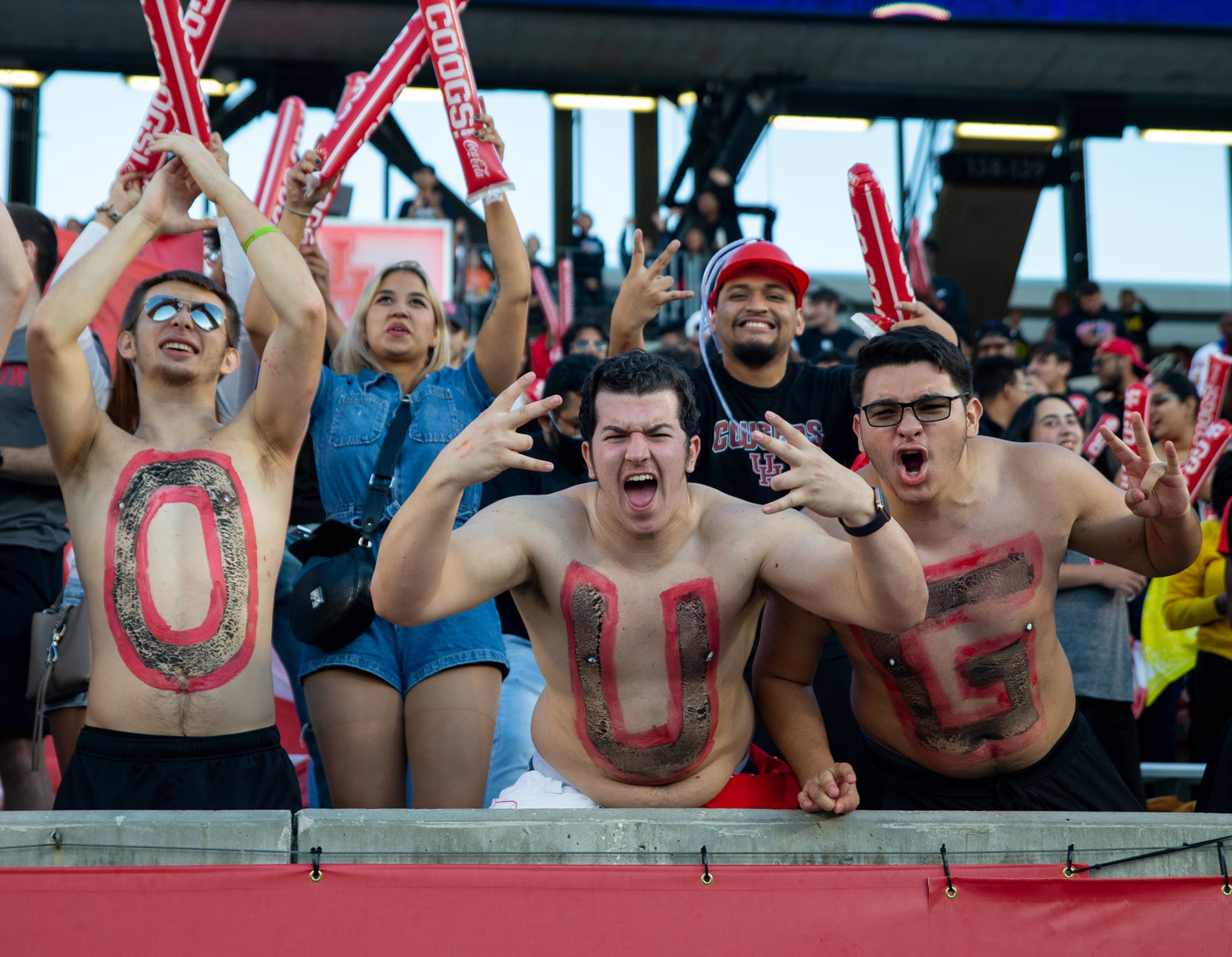 Houston Cougars students cheer during an NCAA football game between Houston and SMU on October 30, 2021 in Houston, Texas.
