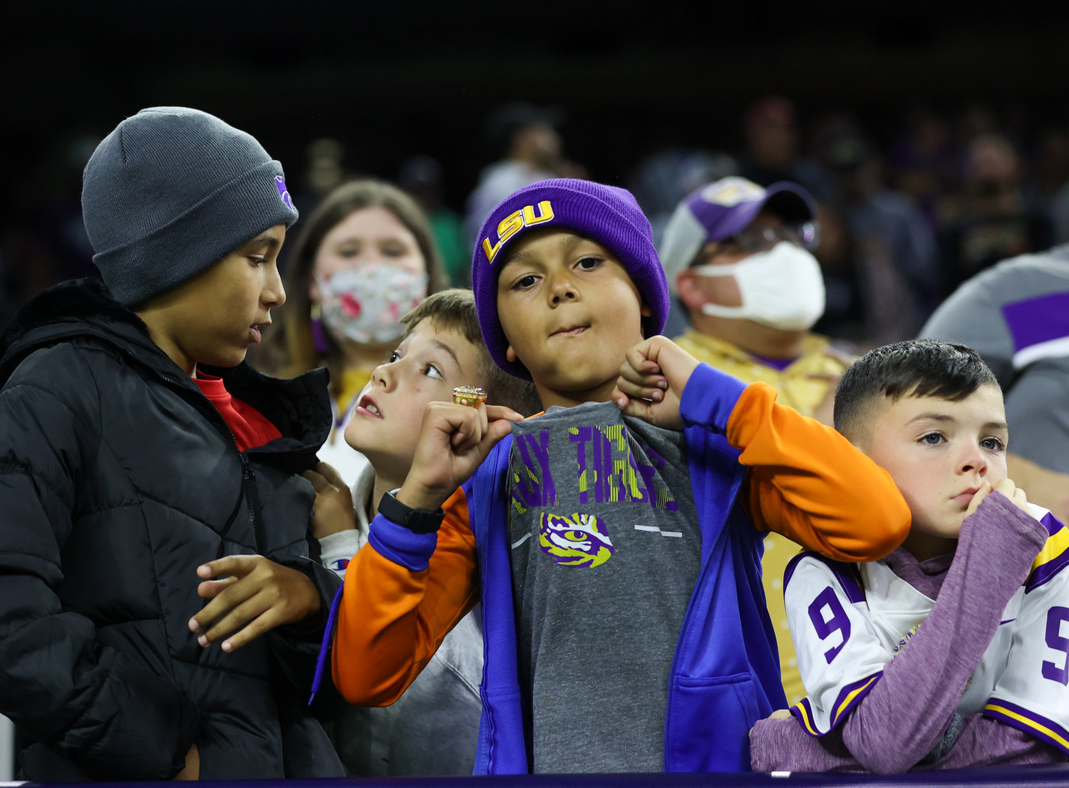 A group of young LSU Tigers fans during the TaxAct Texas Bowl on Jan. 4, 2022 in Houston, Texas.