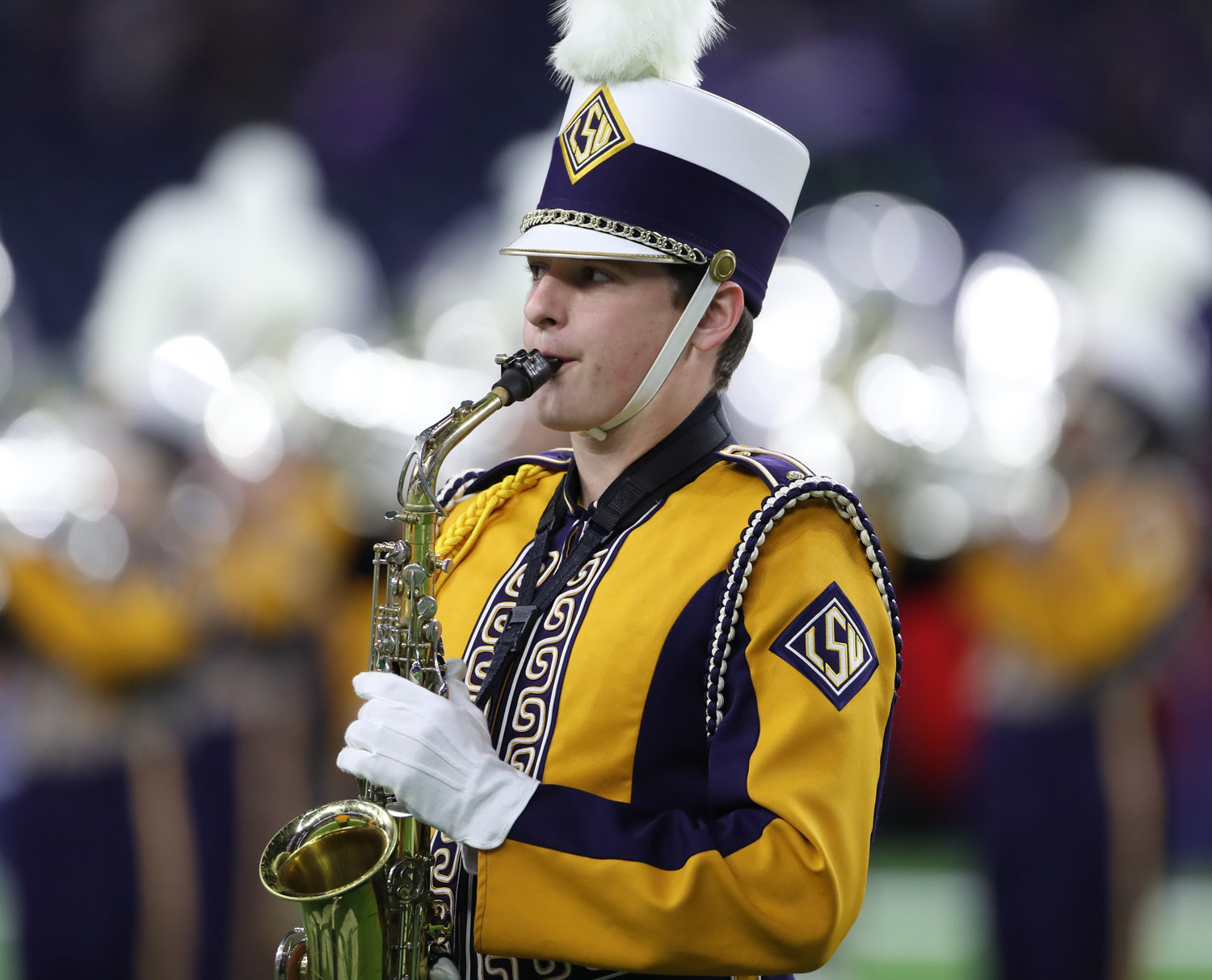A member of the LSU Tigers band performs before the start of the TaxAct Texas Bowl on Jan. 4, 2022 in Houston, Texas.
