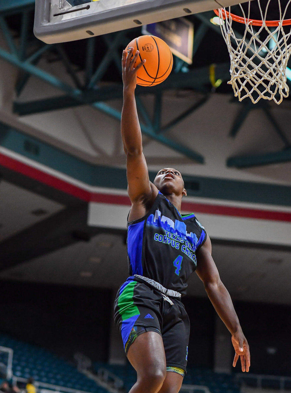 March 12,, 2022:  A&M-Corpus Christis Jalen Jackson #4 drives up to the basket during the Southland Conference Basketball Championship game between A&M Corpus Christi vs Southeastern Louisiana. (Photo by Mark Goodman / Katy Times)