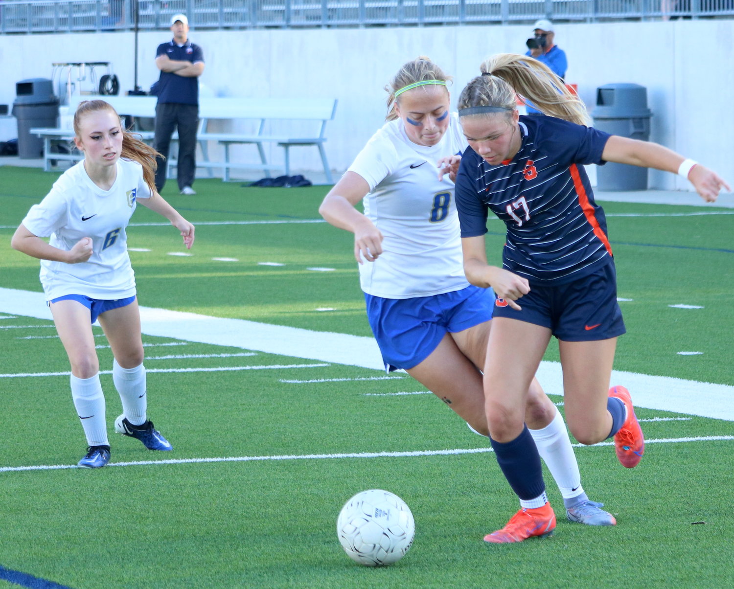Haydan Erck dribbles past a defender during Thursday’s Class 6A bi-district round game between Seven Lakes and Fort Bend Elkins at Legacy Stadium.