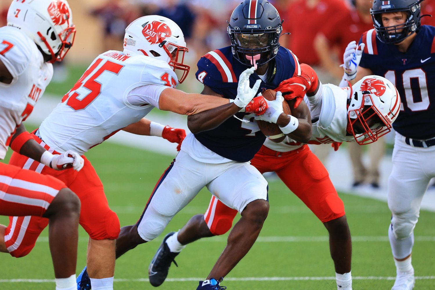 Tompkins Matthew Ogunrin fights for yardage during Saturday’s game between Katy and Tompkins at Legacy Stadium.