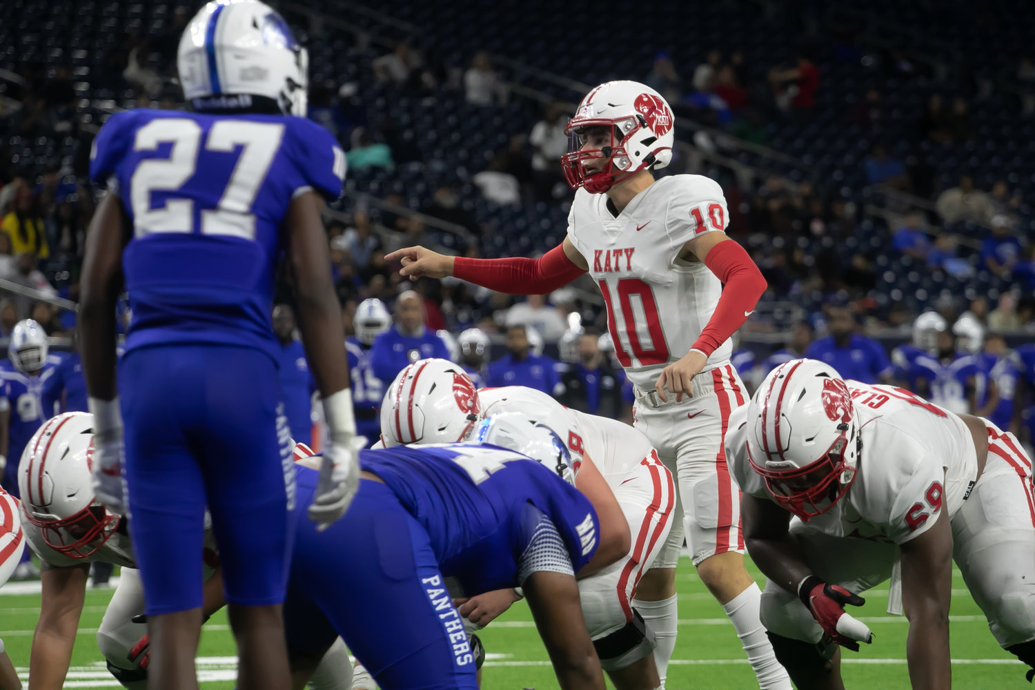 Caleb Koger lines the Katy offense up during Friday's Class 6A-Division II Region III Final between Katy and C.E. King at NRG Stadium.