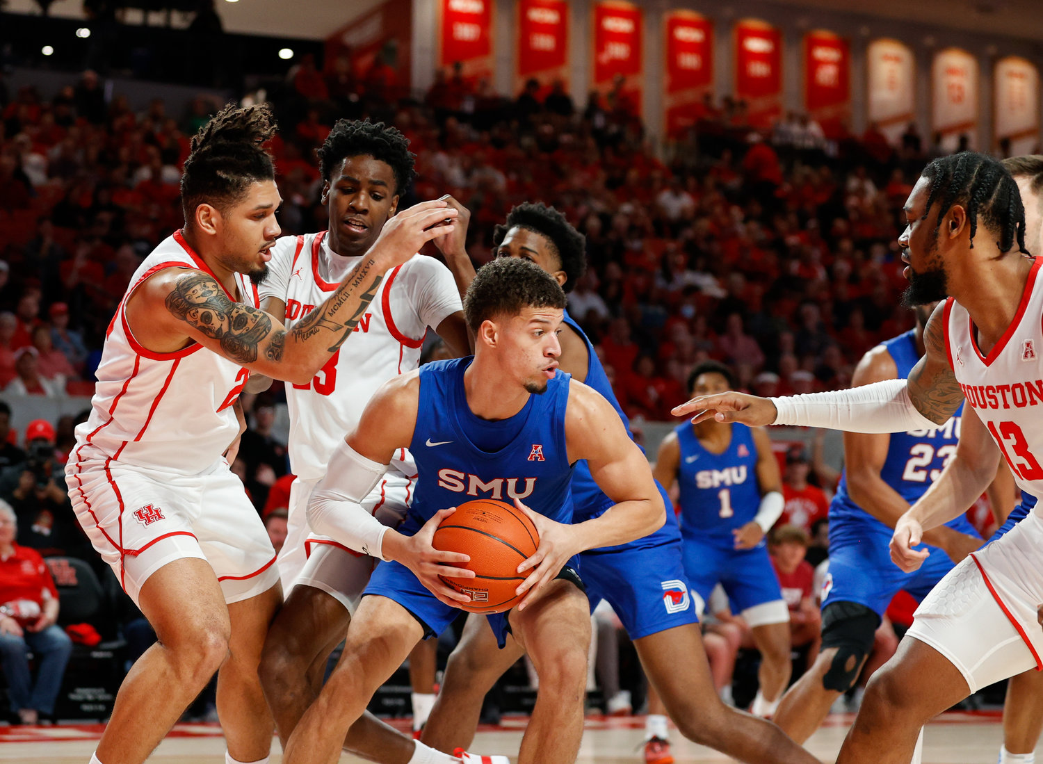 SMU forward Samuell Williamson (11) grabs a rebound during an NCAA men’s basketball game between the Houston Cougars and the Southern Methodist Mustangs on Jan. 5, 2023 in Houston. Houston won, 87-53,