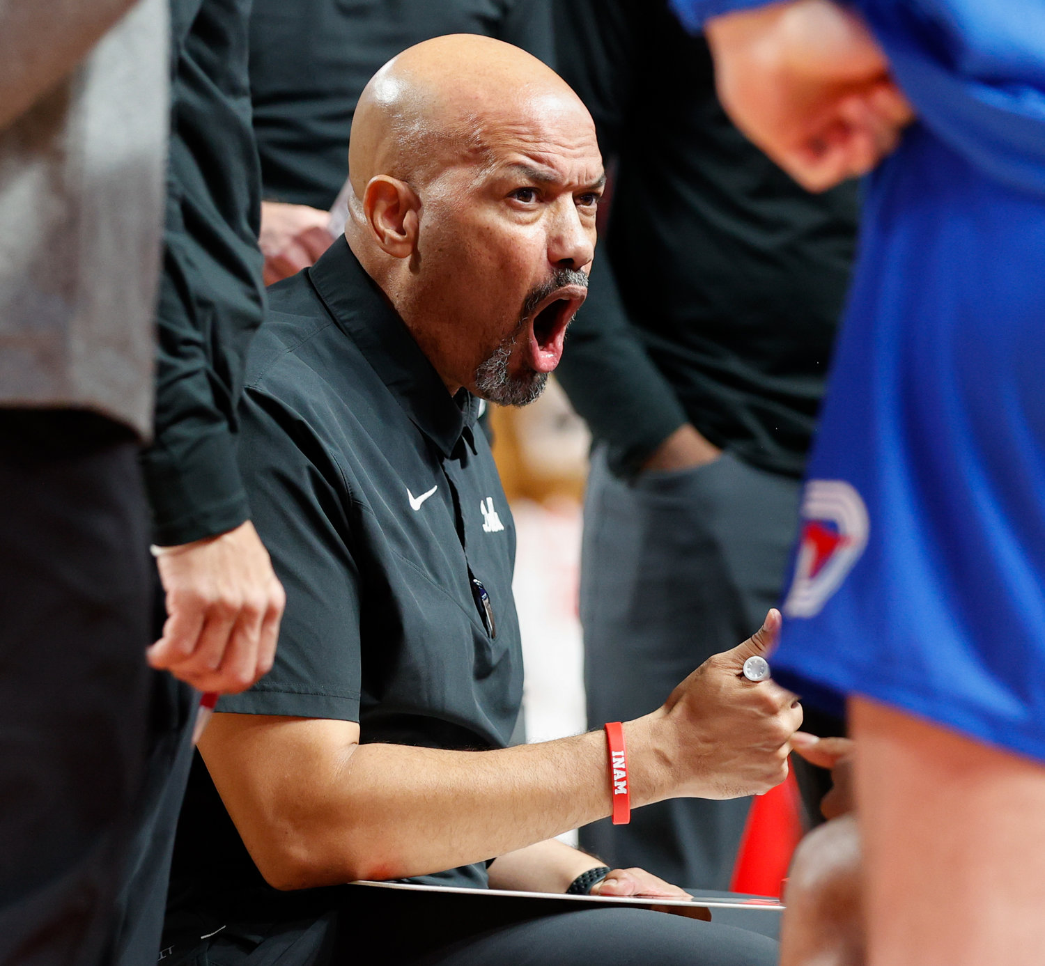 SMU head coach Rob Lanier talks with his team during a timeout during an NCAA men’s basketball game between the Houston Cougars and the Southern Methodist Mustangs on Jan. 5, 2023 in Houston. Houston won, 87-53,