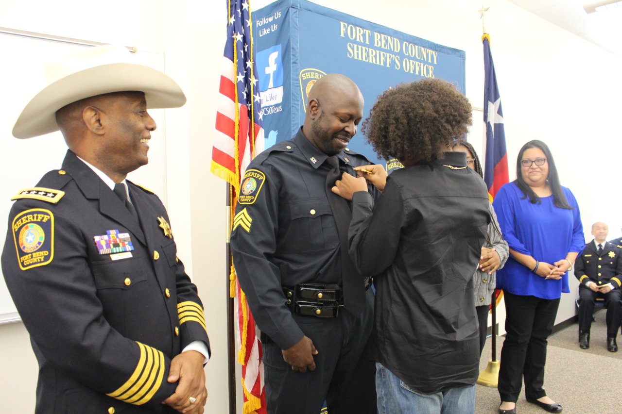 Deputy Terrance Wall was promoted to sergeant. He is a graduate of the FBCSO Gus George Law Enforcement Academy. He obtained his basic instructor certification and was a member of the honor guard. He celebrates 15 years within law enforcement, having also completed eight years with Fort Bend County Constable Precinct 1. Wall was pinned by his son, Zion Wall. Sheriff Eric Fagan (left) looks on.