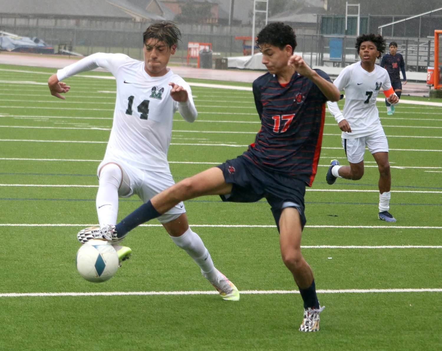 Sean Carlos Rivera tries to bring in a pass during Saturday's game between Seven Lakes and Mayde Creek at the Seven Lakes soccer field.