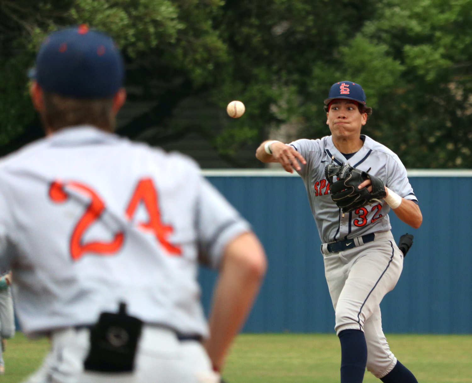 Miguel Acosta throws a ball to first place during Thursday's game between Taylor and Seven Lakes at the Taylor baseball field.