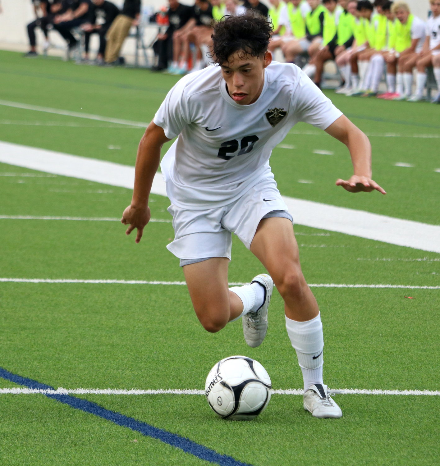 Kevin Sanoja dribbles during Friday's Class 6A Regional Quarterfinal between Jordan and Paetow at Legacy Stadium.