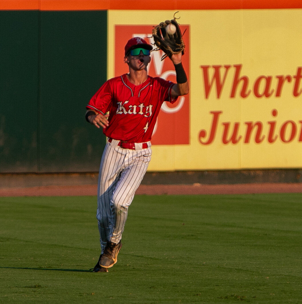 Andrew Hilton catches a fly ball during Friday's Regional Final between Katy and Pearland at Constellation Field in Sugar Land.