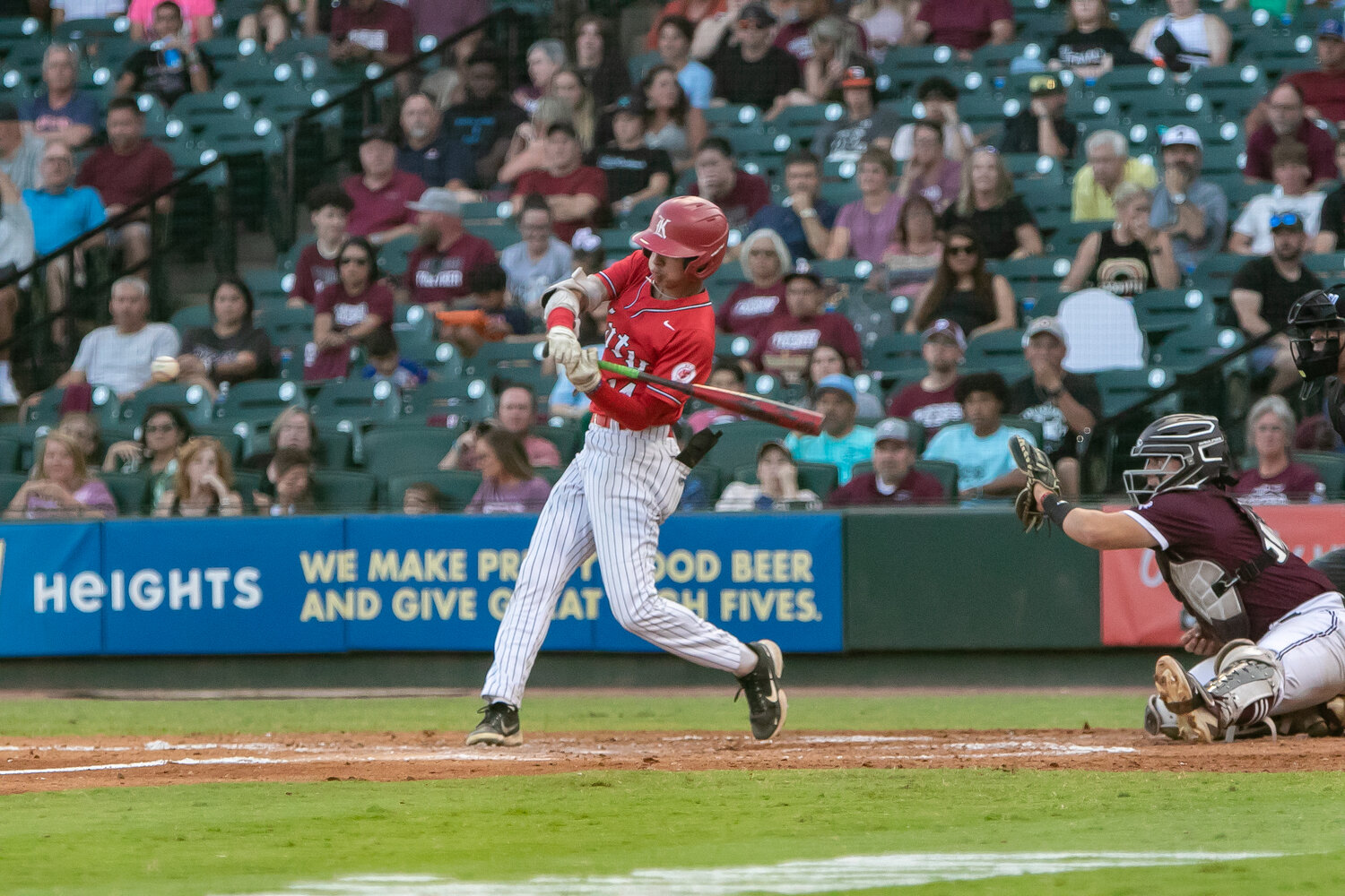 AJ Atkinson hits during Friday's Regional Final between Katy and Pearland at Constellation Field in Sugar Land.