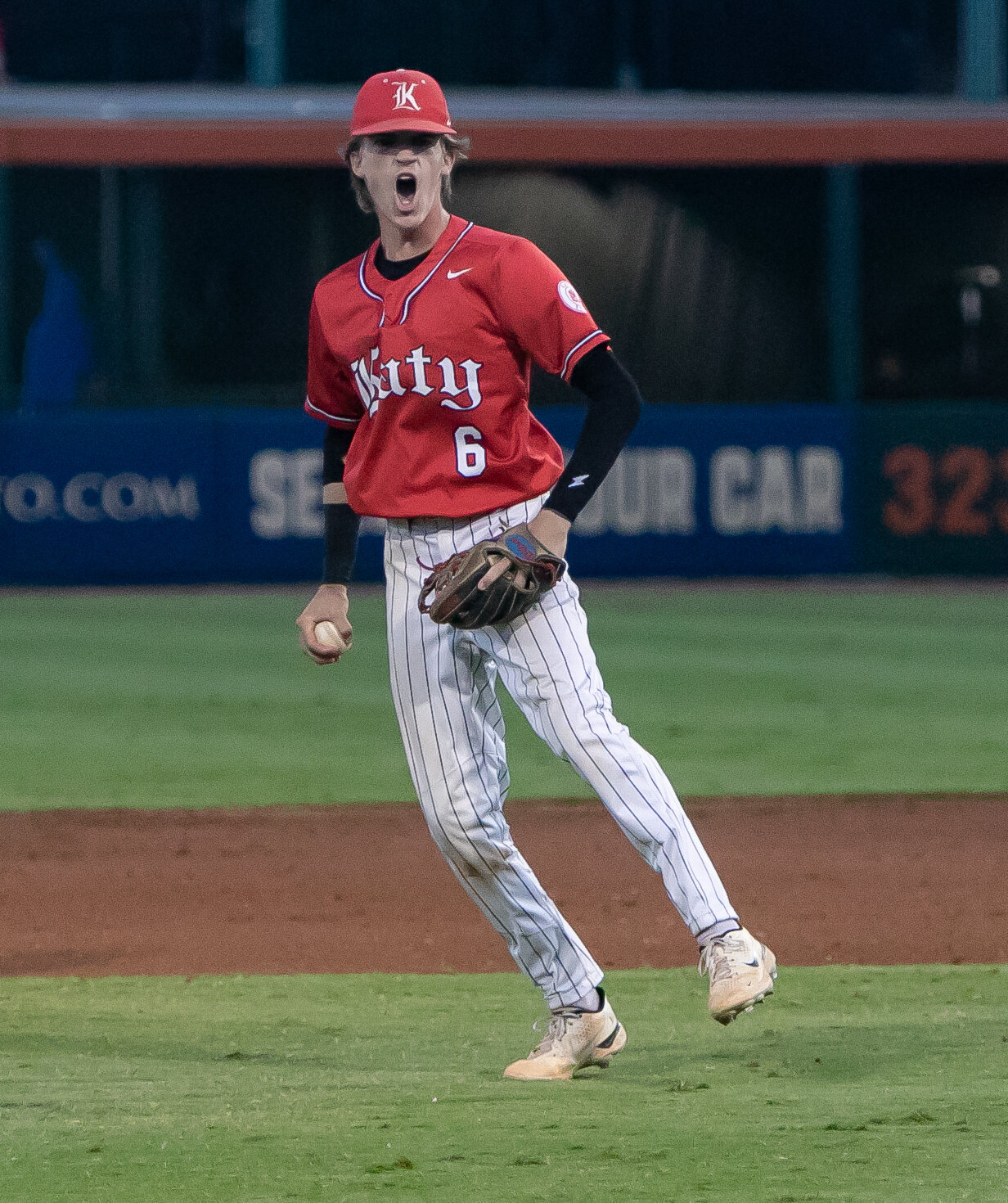 Josh Dunayczan celebrates after making a play during Friday's Regional Final between Katy and Pearland at Constellation Field in Sugar Land.