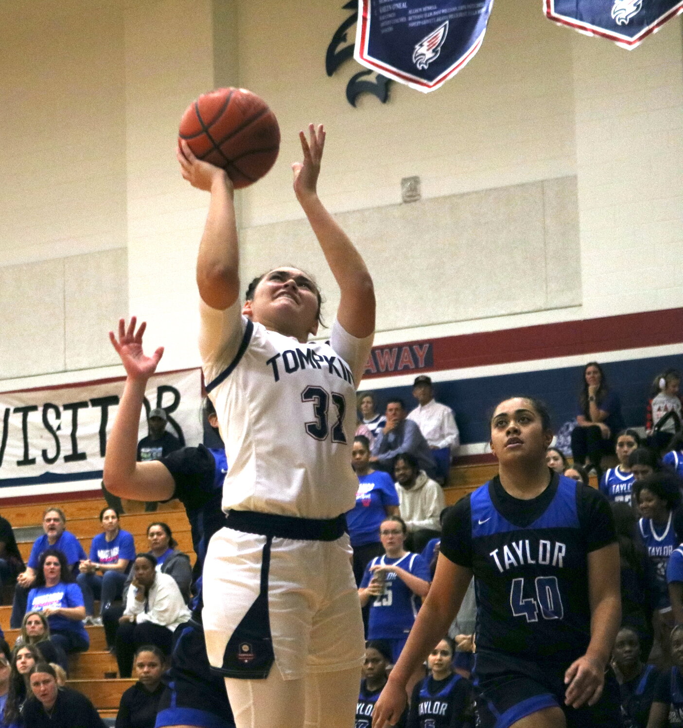 Rihanna DeLeon shoots a layuup during Friday's game between Taylor and Tompkins at the Tompkins gym.